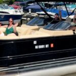 Pontoon boat rental on Lake Hopatcong with group enjoying a summer day