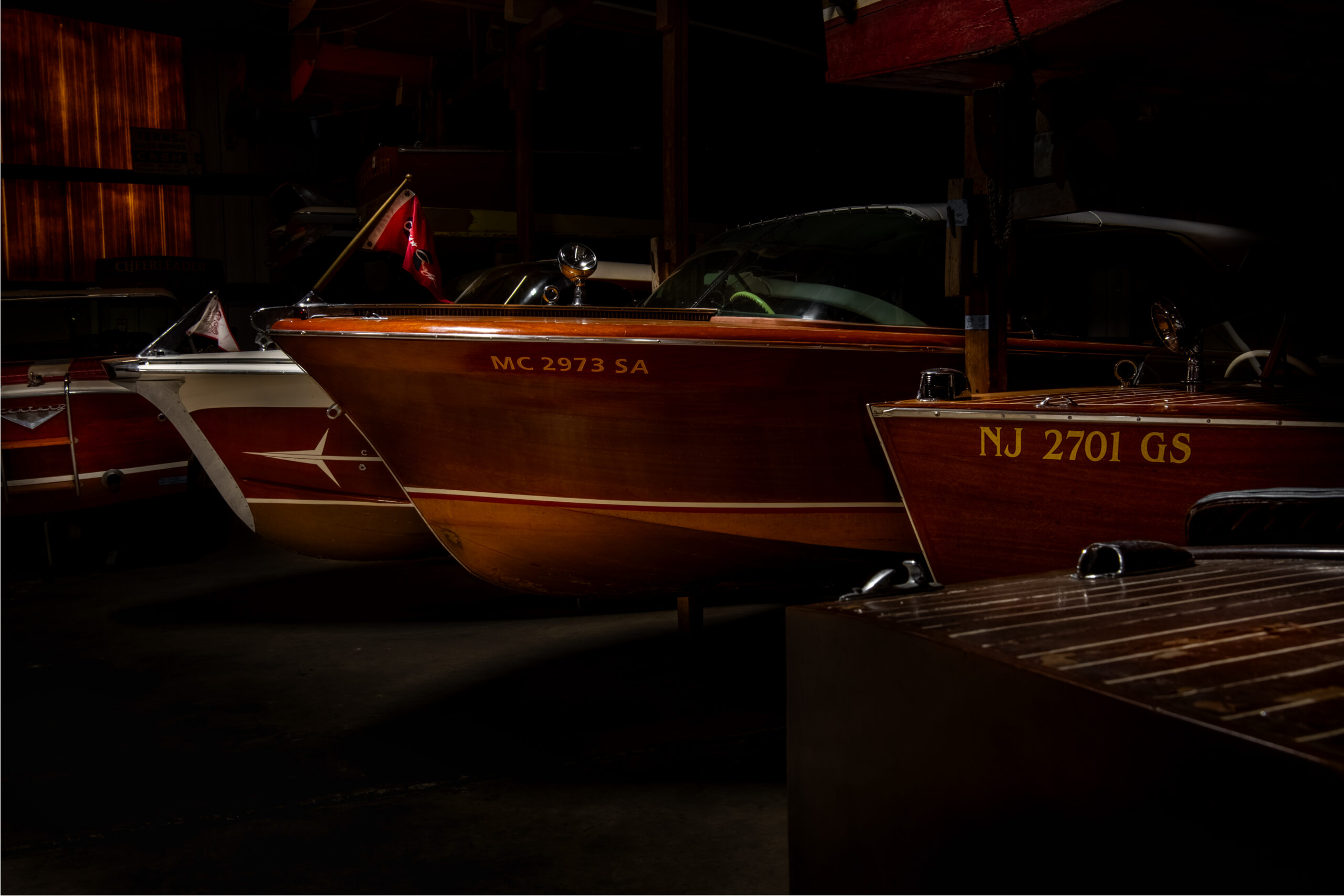 A line up of Chris Craft boats at Henderson Bridge Marina on Lake Hopatcong, NJ